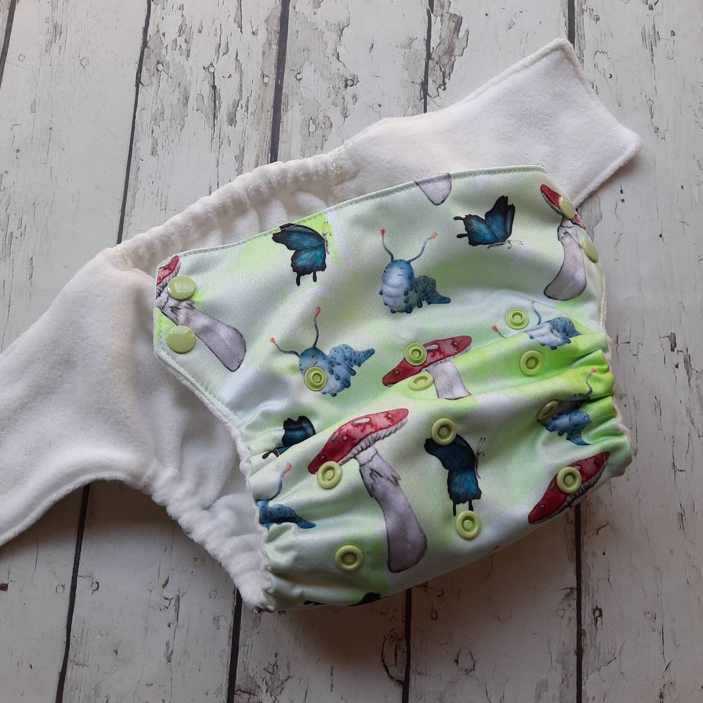 One Size Side Snap Pocket Cloth Diaper Alice and the Caterpillar 10-48 lbs